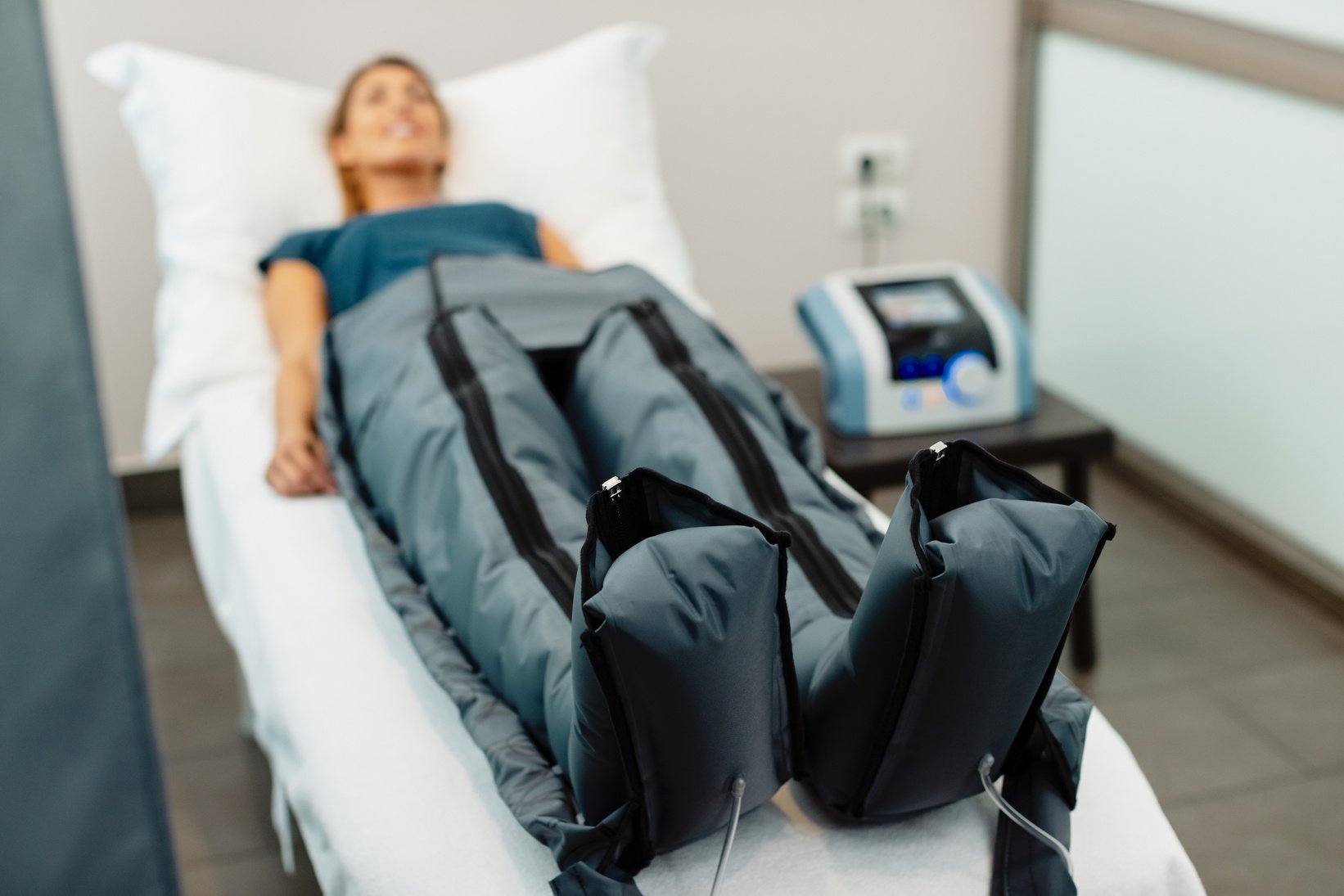 Close-up of pressotherapy treatment at spa center.